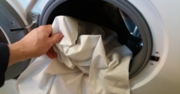 Wash grounding sheet in washing machine